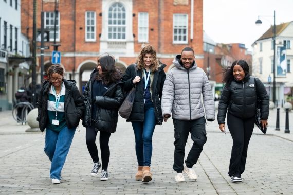 Group of students walking around High Wycombe town