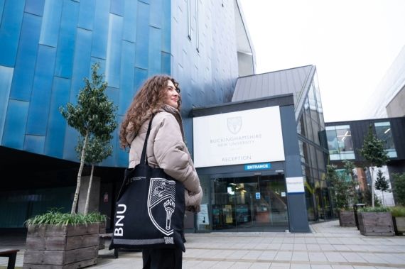 Student walking towards the university