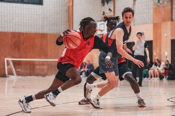 Students playing basketball