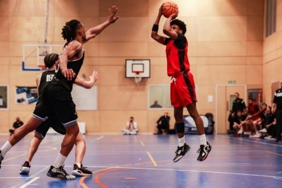 Students playing basketball
