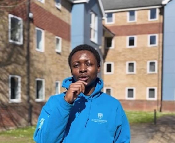 Headshot of ambassaor Mitchell outside of Brook Street halls.