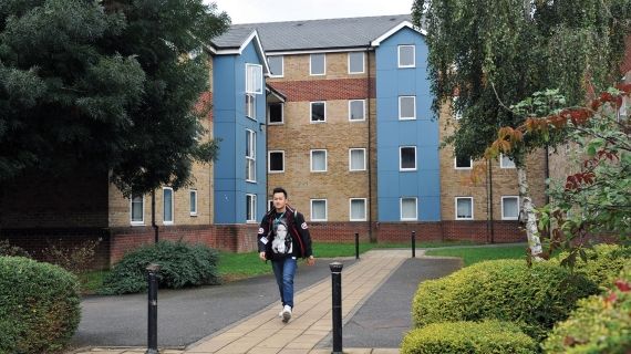 BNU student walking outside Brook Street accommodation