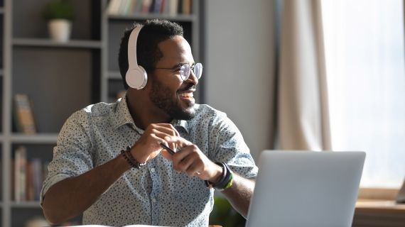 Source african man listening to music with headfones