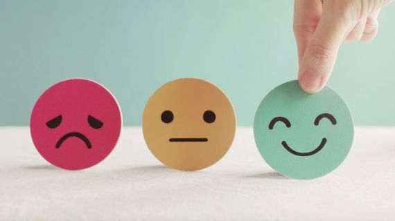 Three faces to show different emotion - mental health