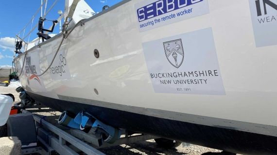 Ian Rivers' boat with Buckinghamshire New University branding
