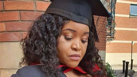 Chimwemwe Sukali in graduation cap and gown