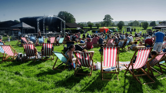 students in sunshine at Subwoofers Student Event