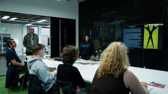 Creative Advertising class with students and lecturer