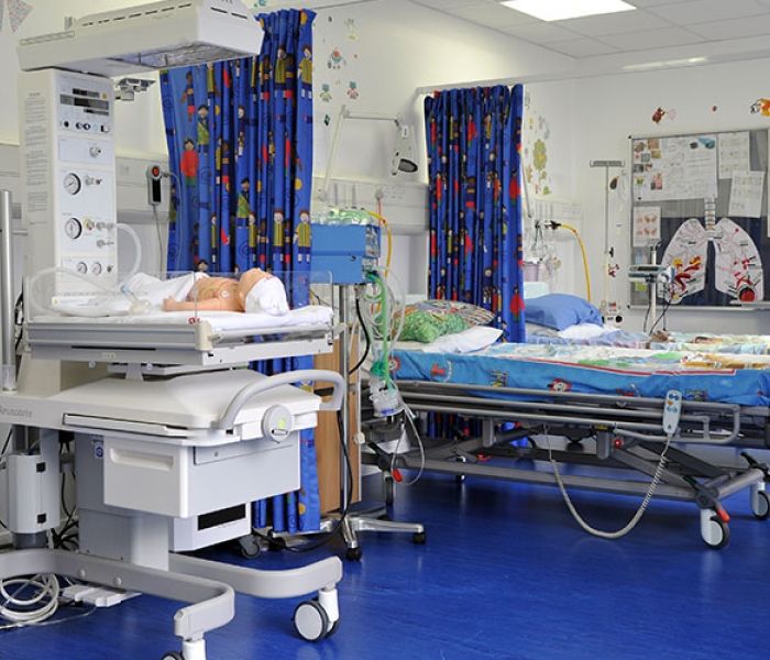 Simulation ward at Uxbridge Campus with beds and baby mannequin