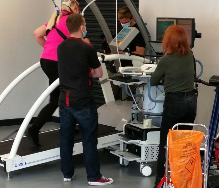 human performance lab students on machine