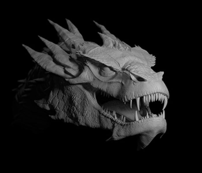 A white sculpture of a dragons skull against a black background