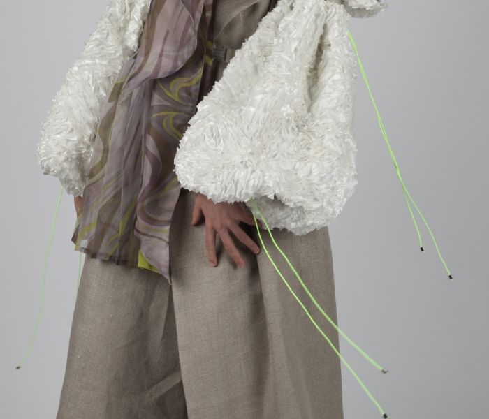 Fashion Design male Student work posing in outfit