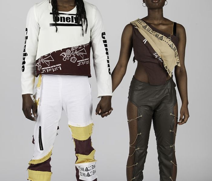 Fashion Design Students in white and dark outfits