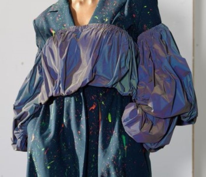 Fashion Design female student posing in blue outfit