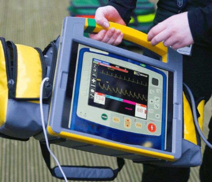 Using iSimulate technology to practice with realistic patient monitors and defibrillators.