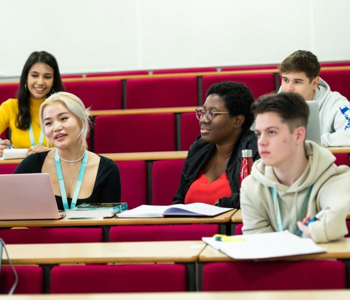 five students in lecture theatre