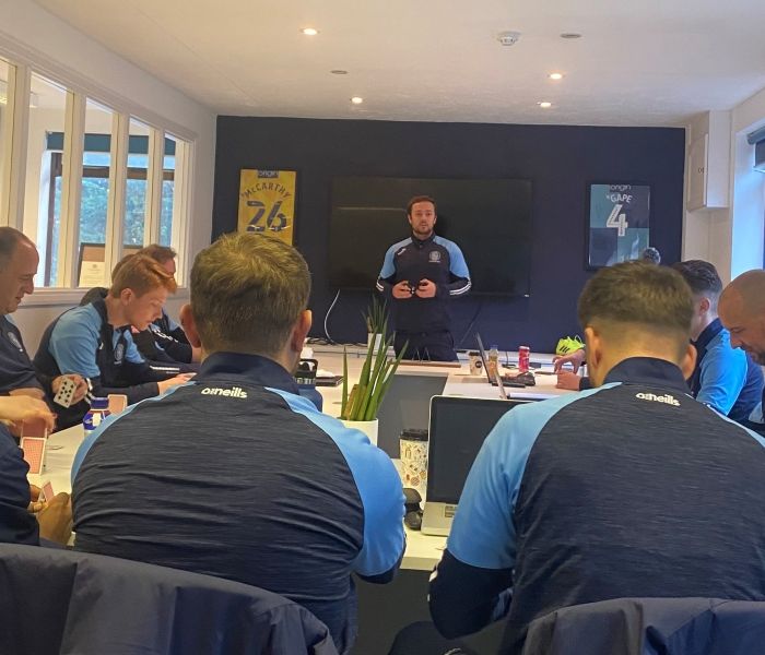 Wycombe Wanderers management team meeting around a table