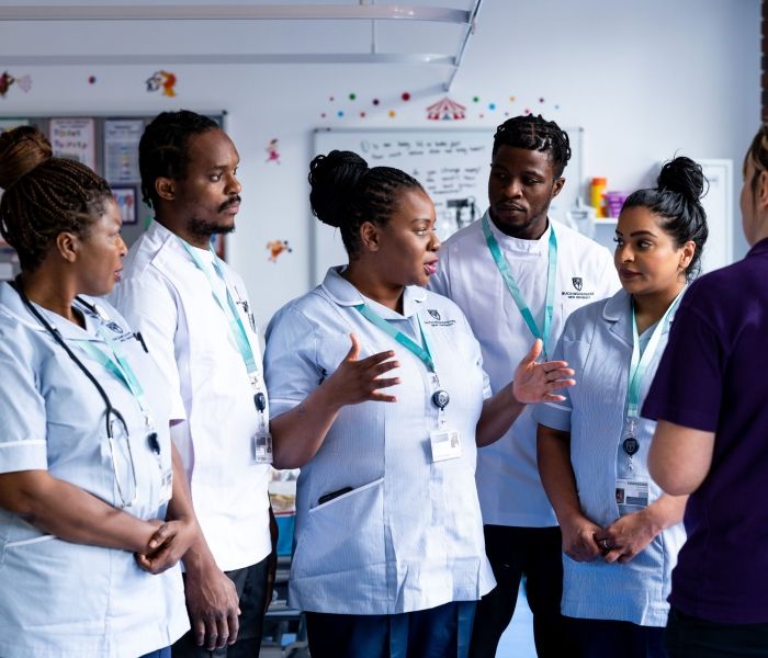 people standing and talking