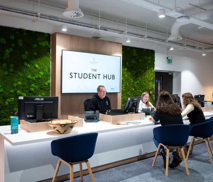 Students and staff in Student Hub