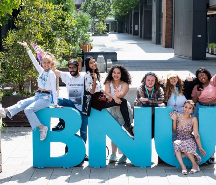 Students on BNU sign