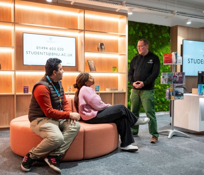 students in the student hub in atrium