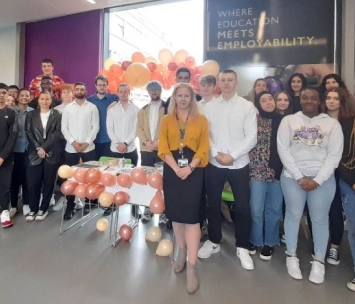 Business students presenting their work at the year-end showcase