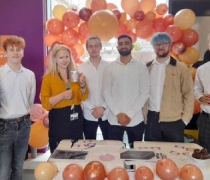 Business students presenting their work at the year-end showcase