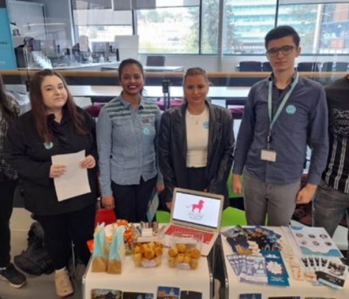 Business students presenting their work at the year-end showcase