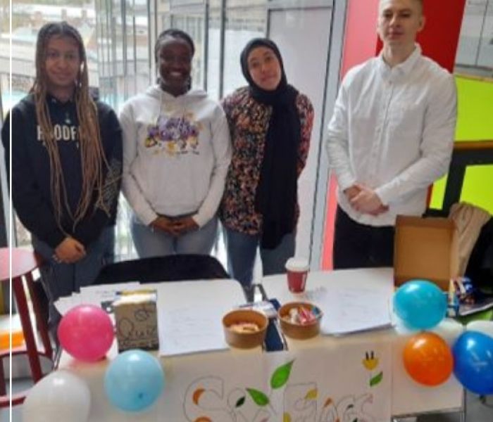 Business students presenting their work at the year-end showcase