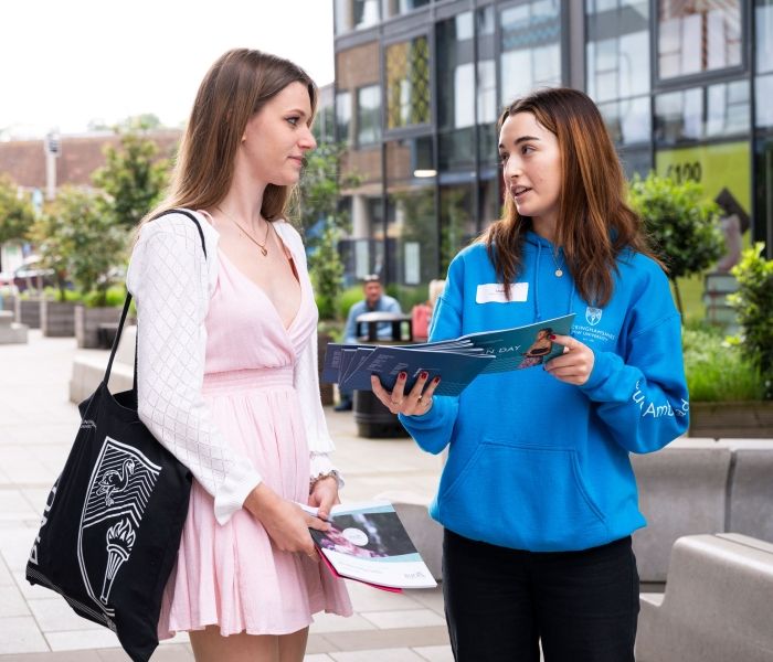 Student Ambassador talking to prospective student at an Open Day