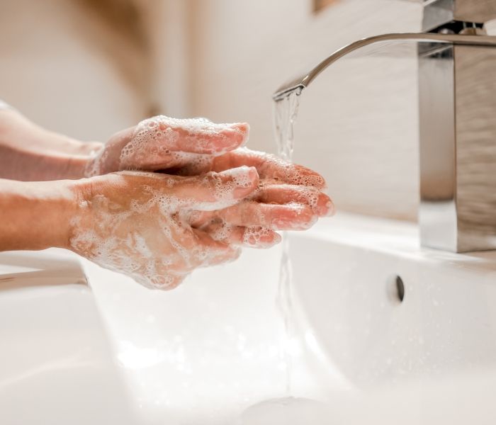Person washing their hands