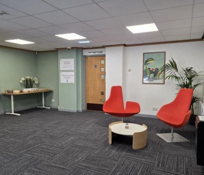 Communal space at Alex House with tables and chairs