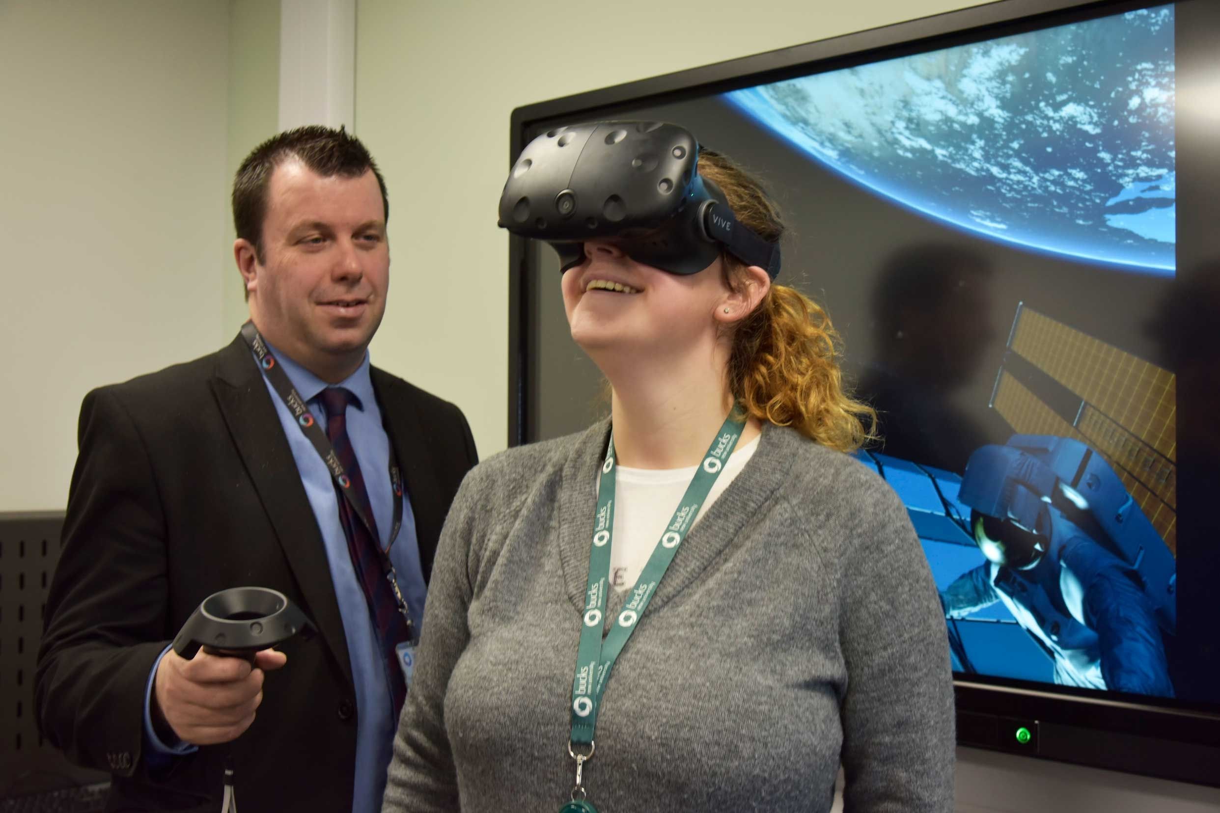 Female student wearing HTC VR software virtual reality psychology