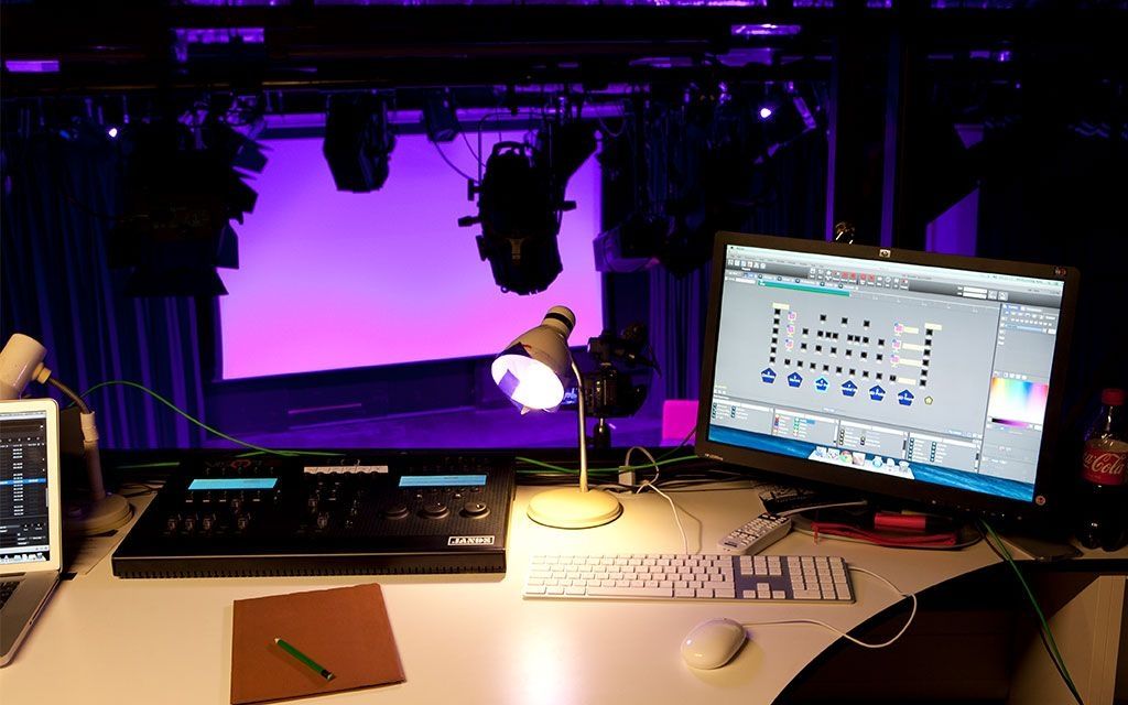 computer looking over a stage