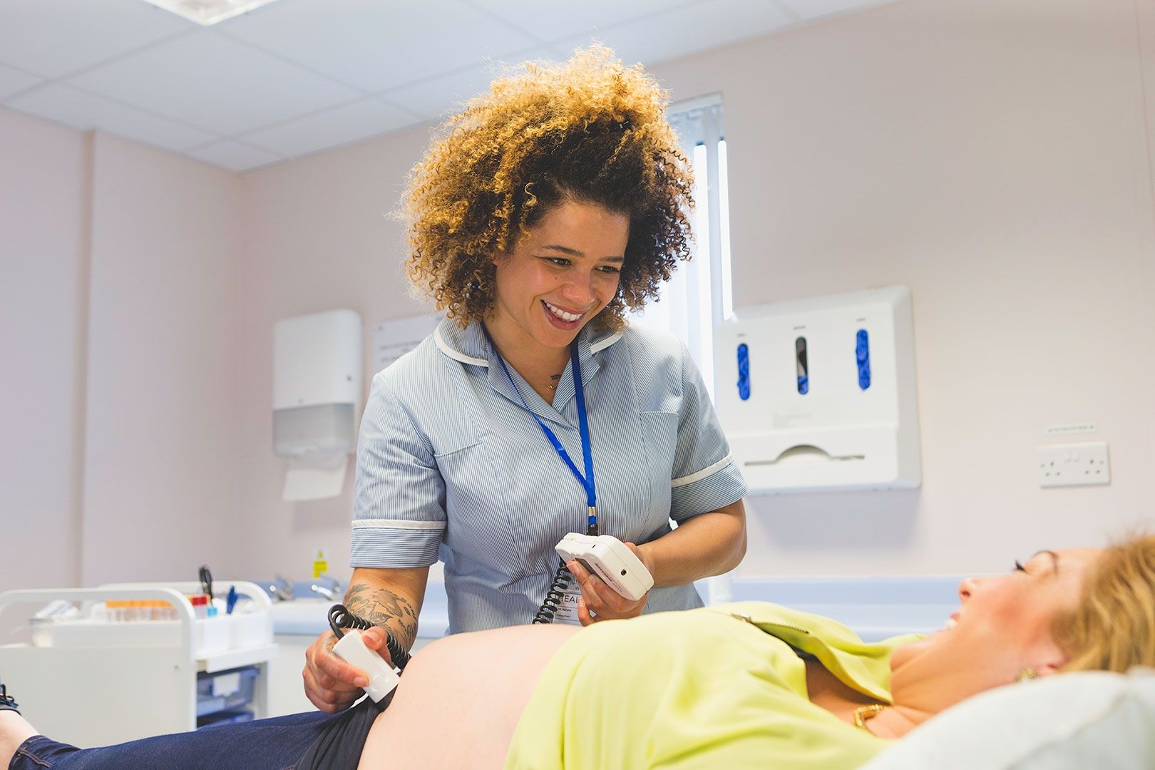 Midwifery student taking ultra sound 