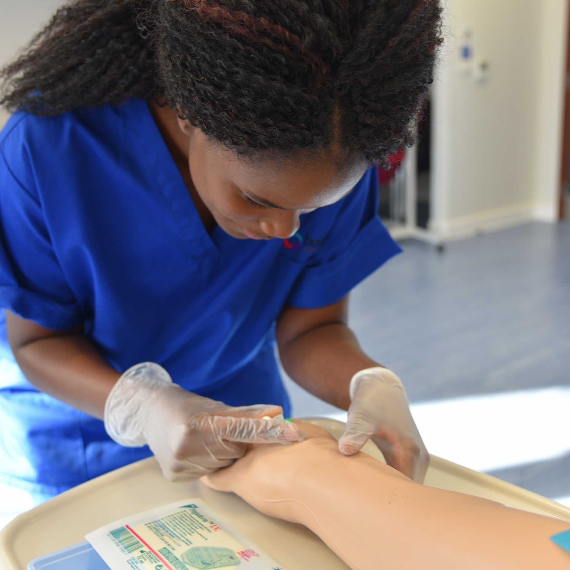 ODP student practicing on mannequin 