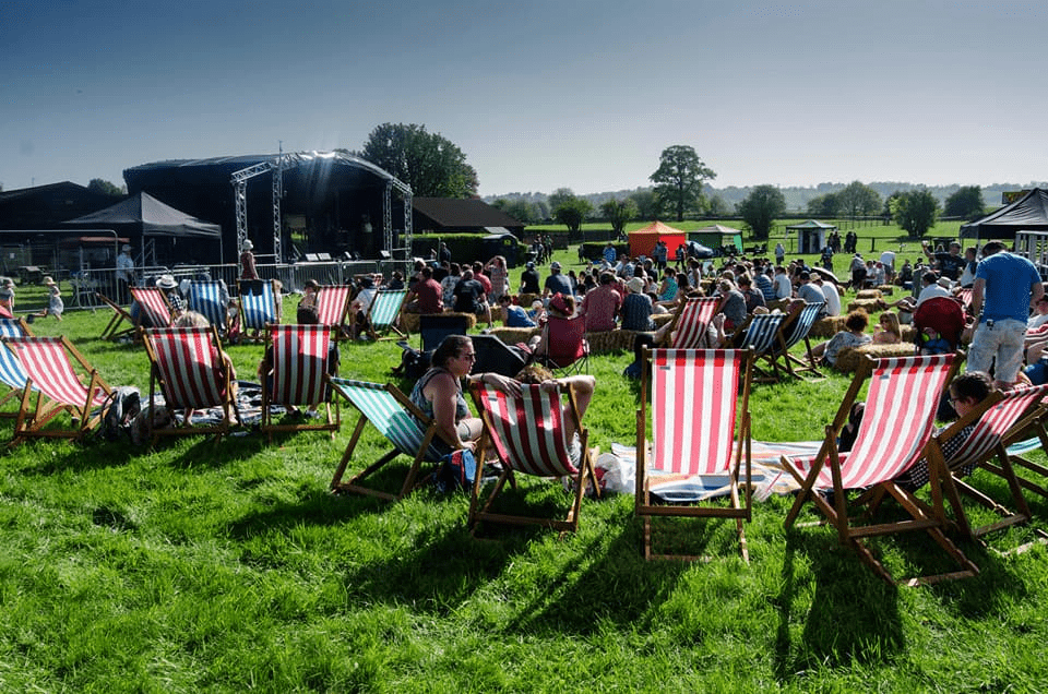 students in sunshine at Subwoofers Student Event