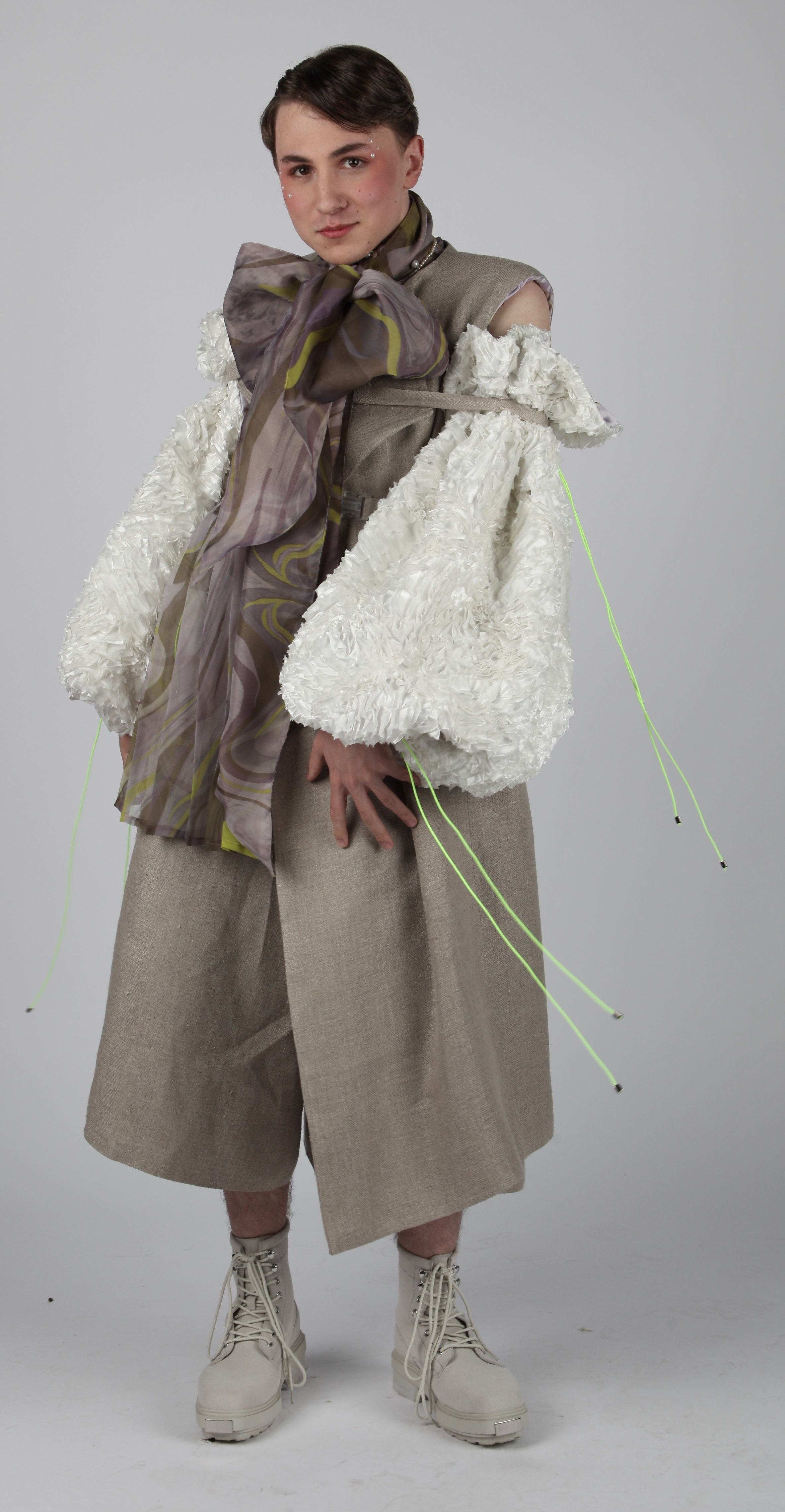 Fashion Design male Student work posing in outfit