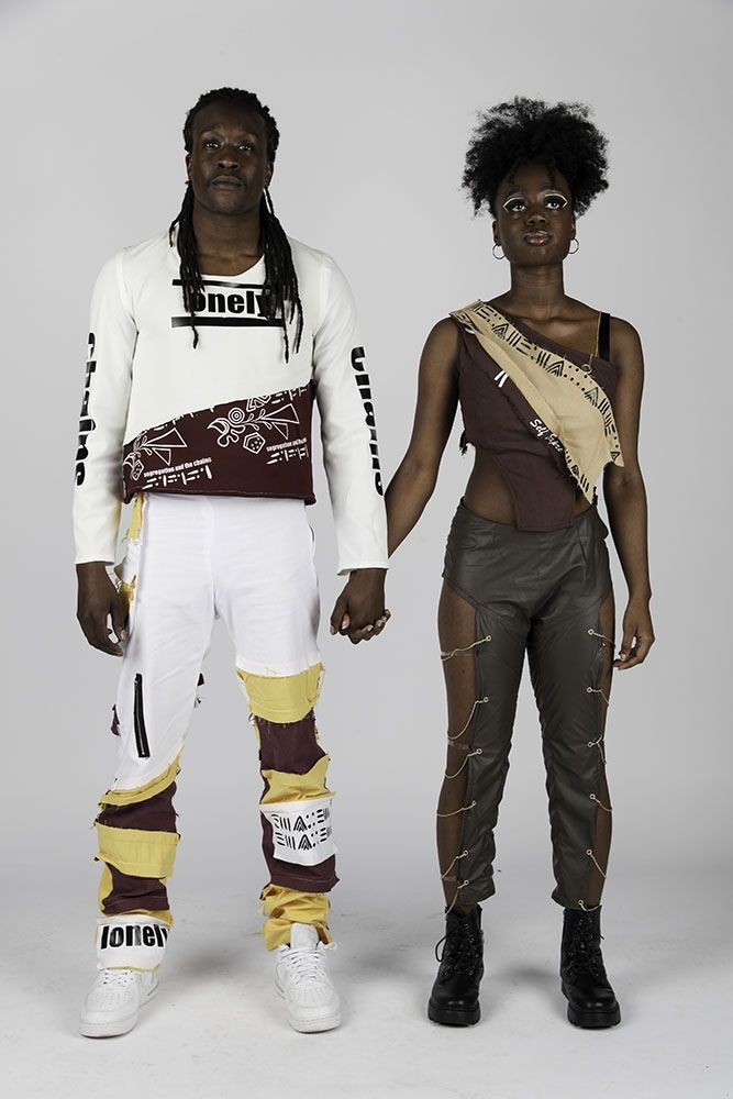 Fashion Design Students in white and dark outfits