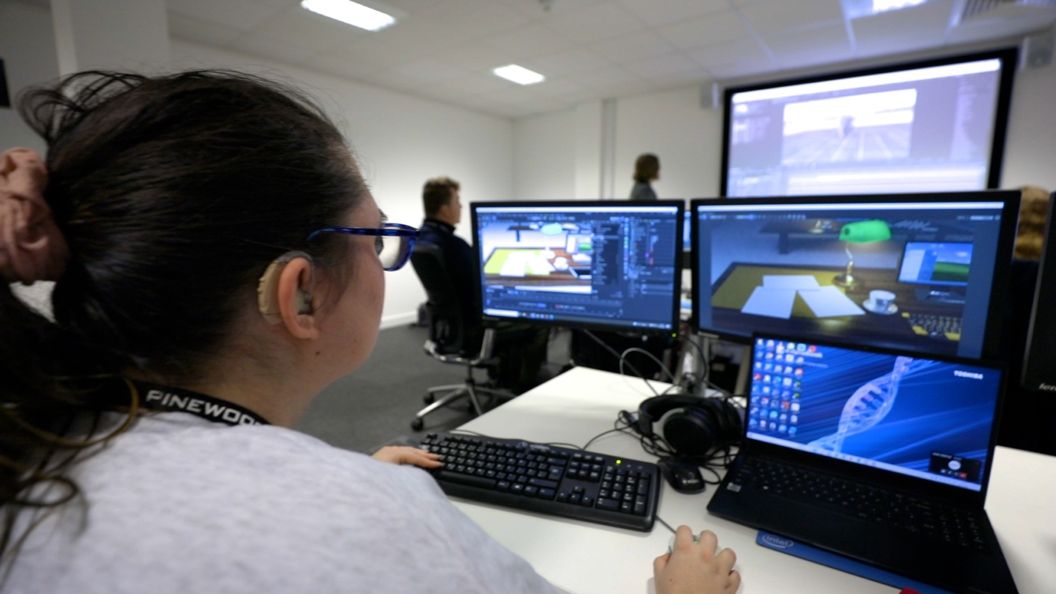 Female student using equipment at BNU based at Pinewood Studios
