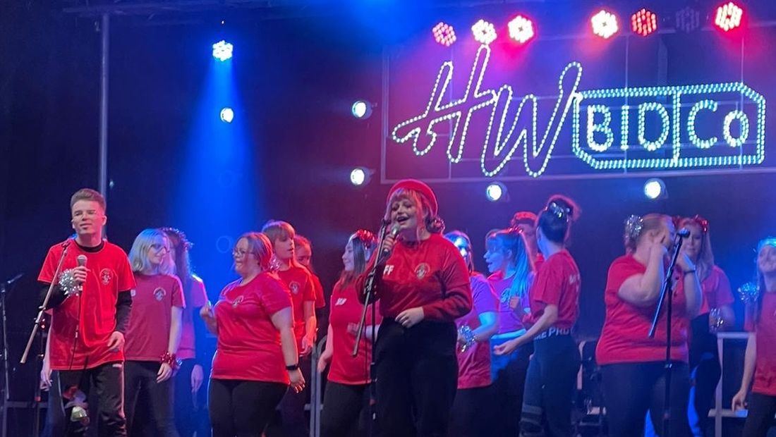 BNU Musical Theatre Society performs on stage at High Wycombe Christmas light switch on