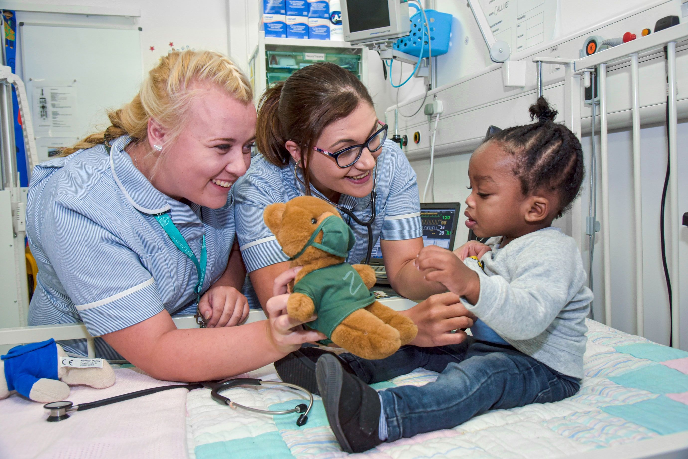 Children nurses with baby