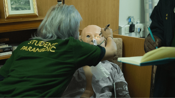 A student completing a medical assessment on one of our advanced patient simulators