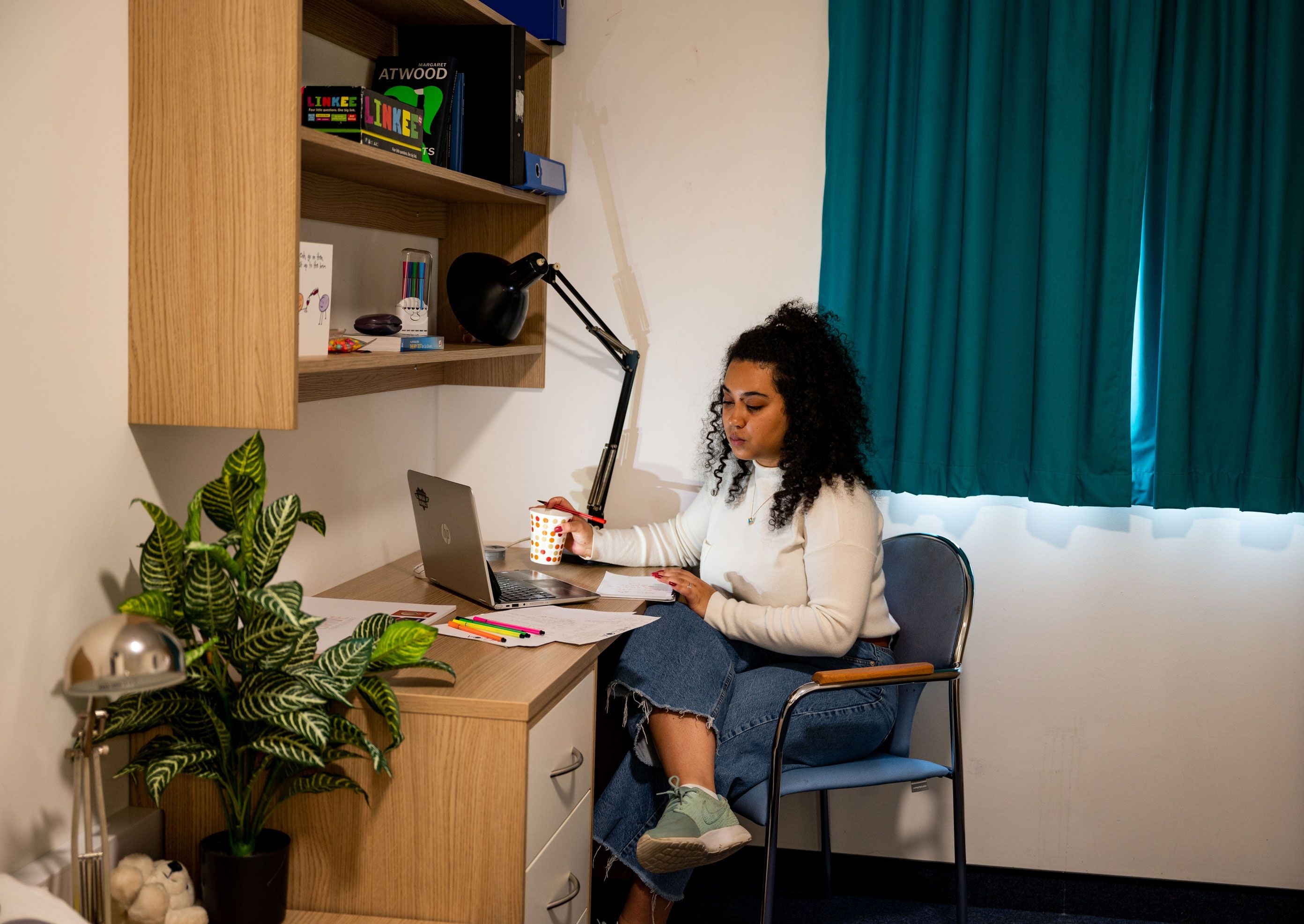Female students studying at one of Hughenden's bedrooms