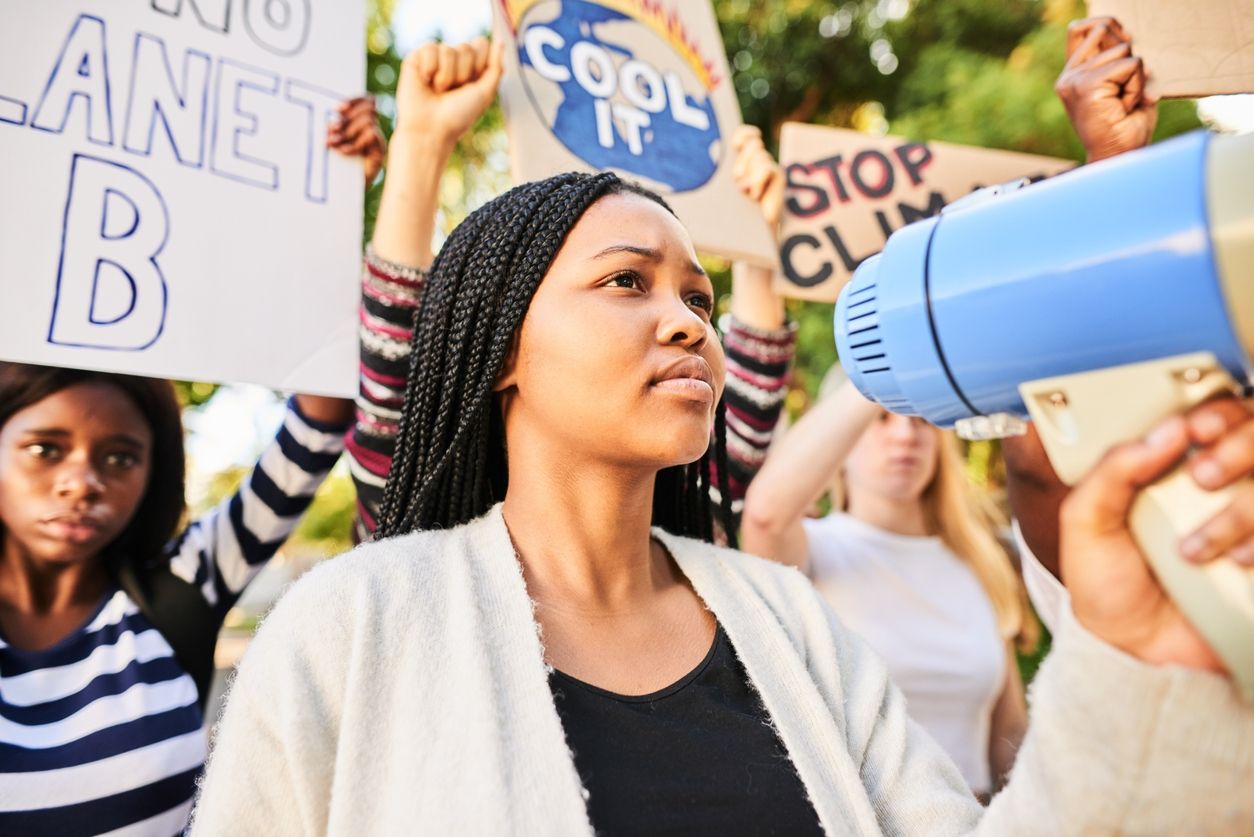 lady protesting with megaphone