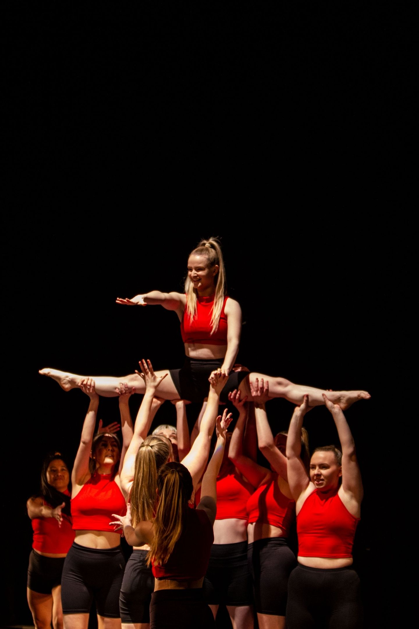 Group of Dance students lifting