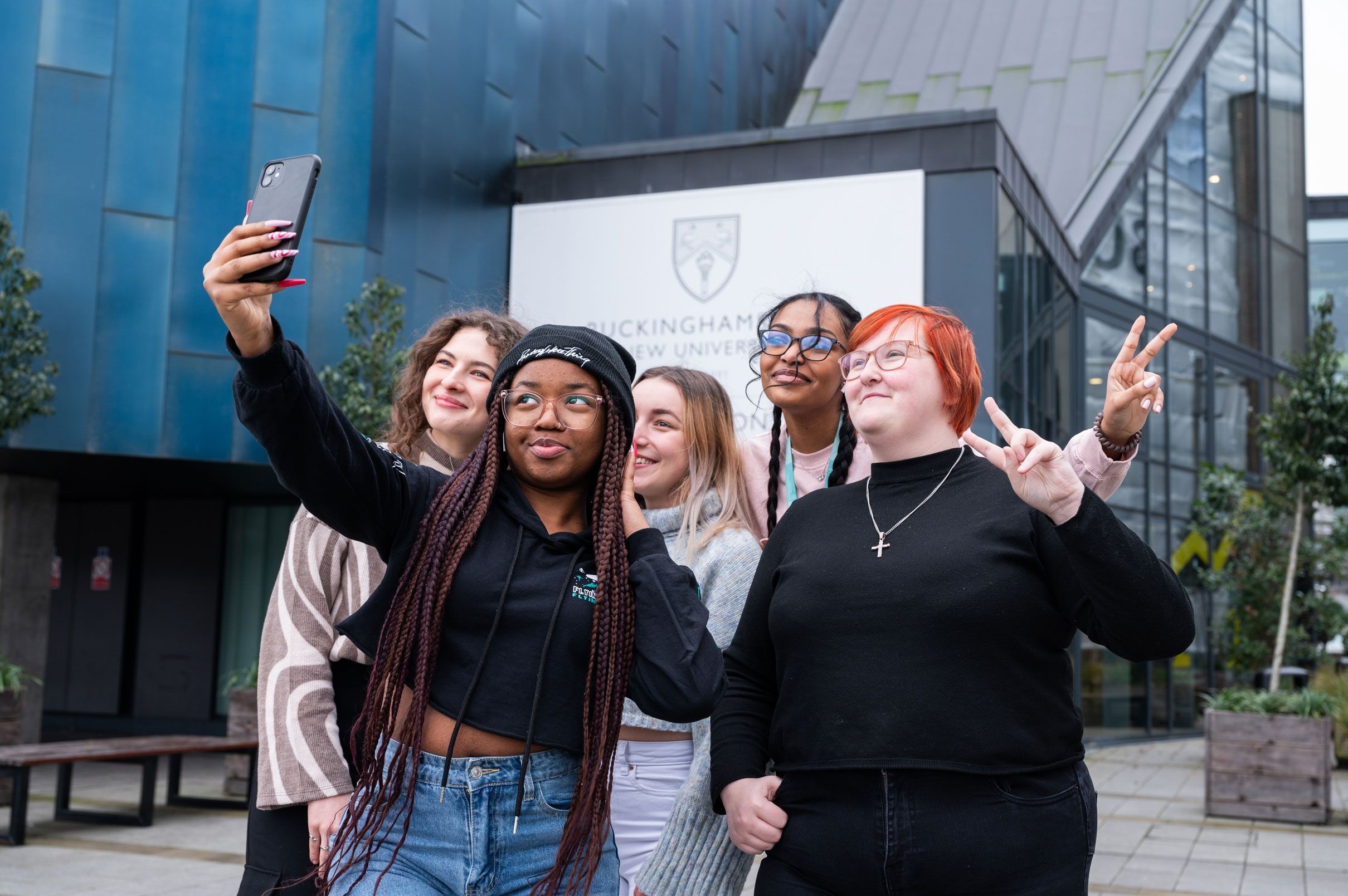Group of student ambassadors outside Gateway building