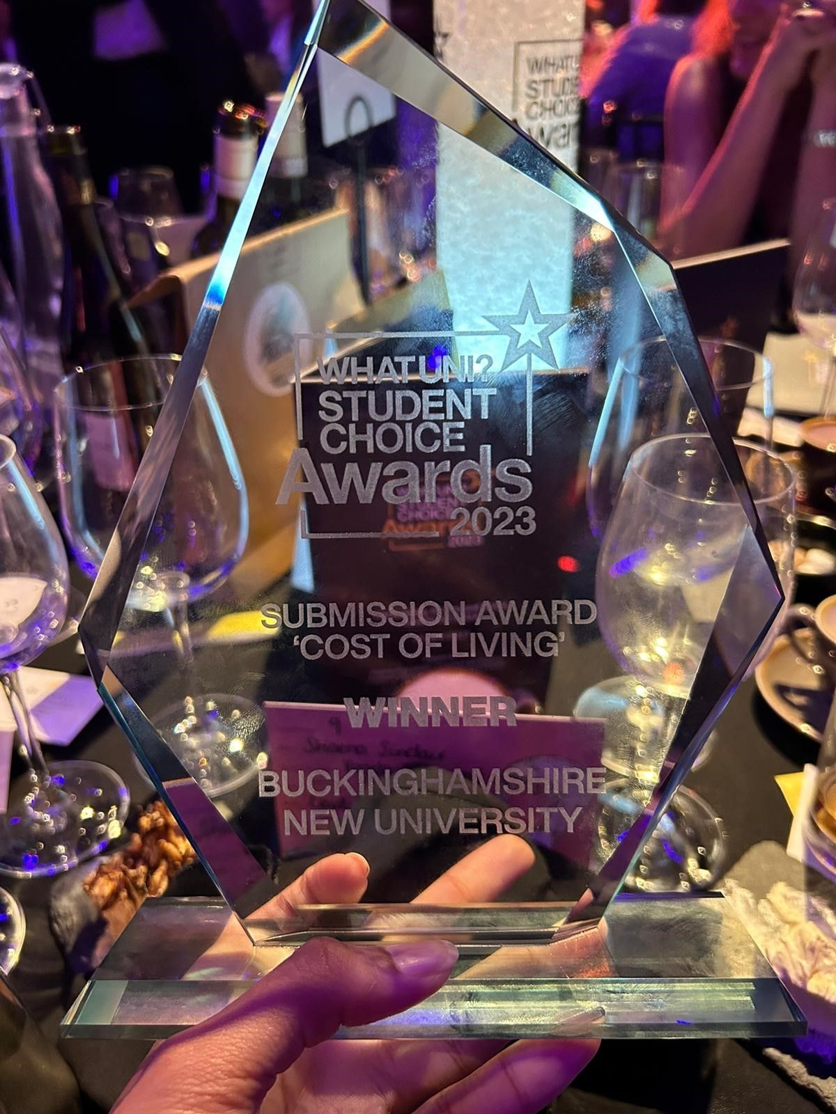 Trophy entitled: "Whatuni student choice awards 2023. Submission award 'cost of living'. Winner: Buckinghamshire New University"