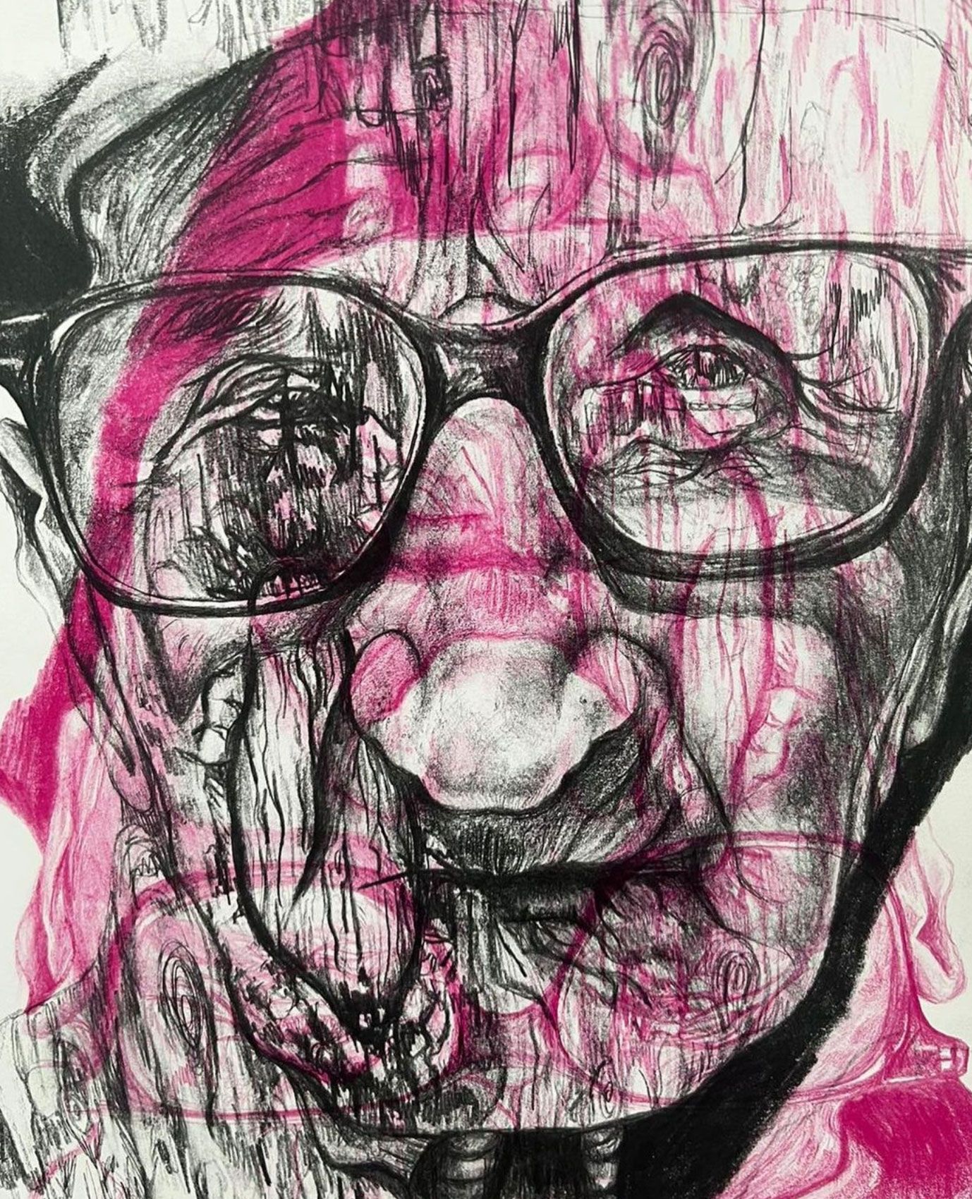 A drawing of a man's face with pink splashes over his face.