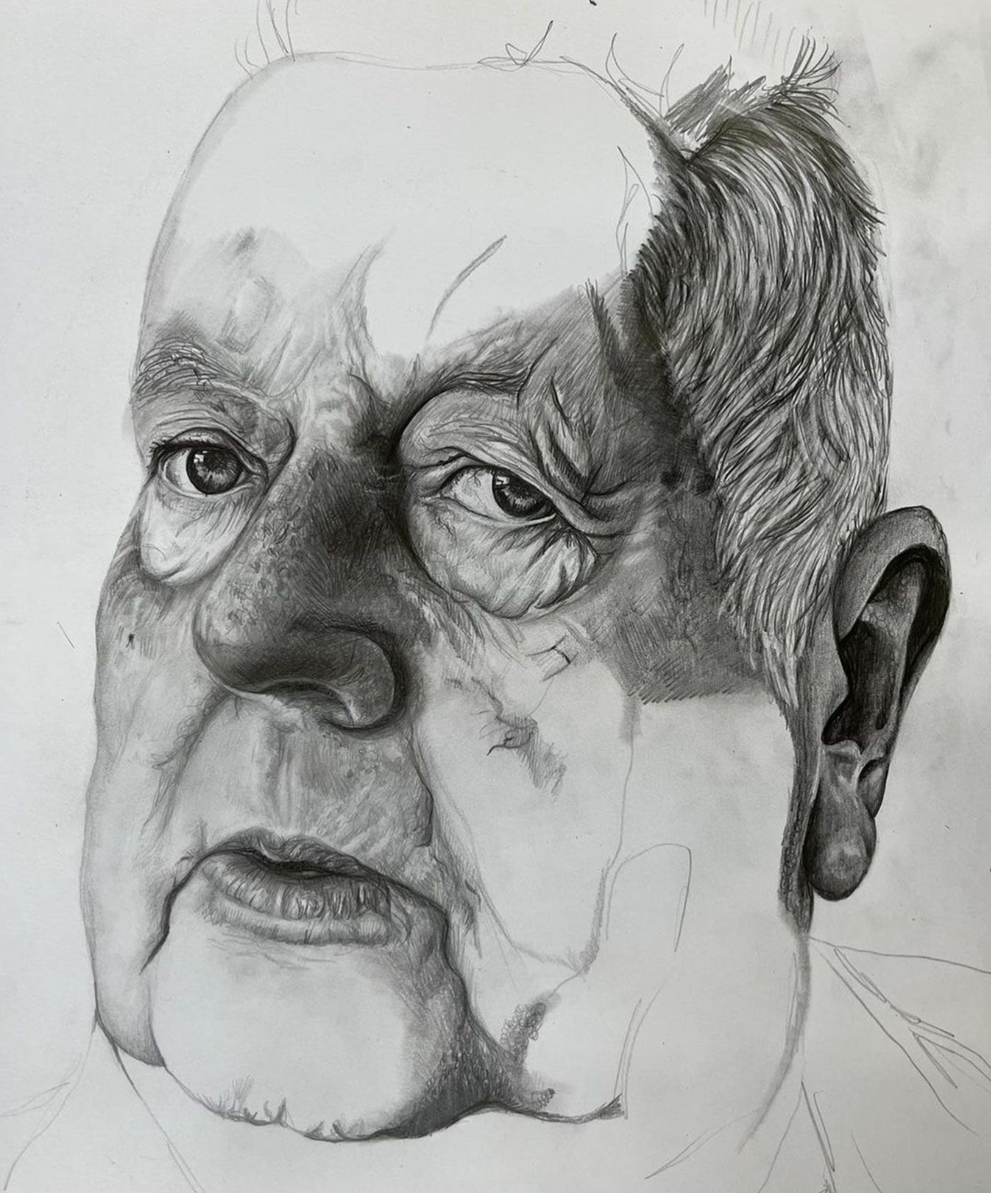 An unfinished drawing of a man's face.